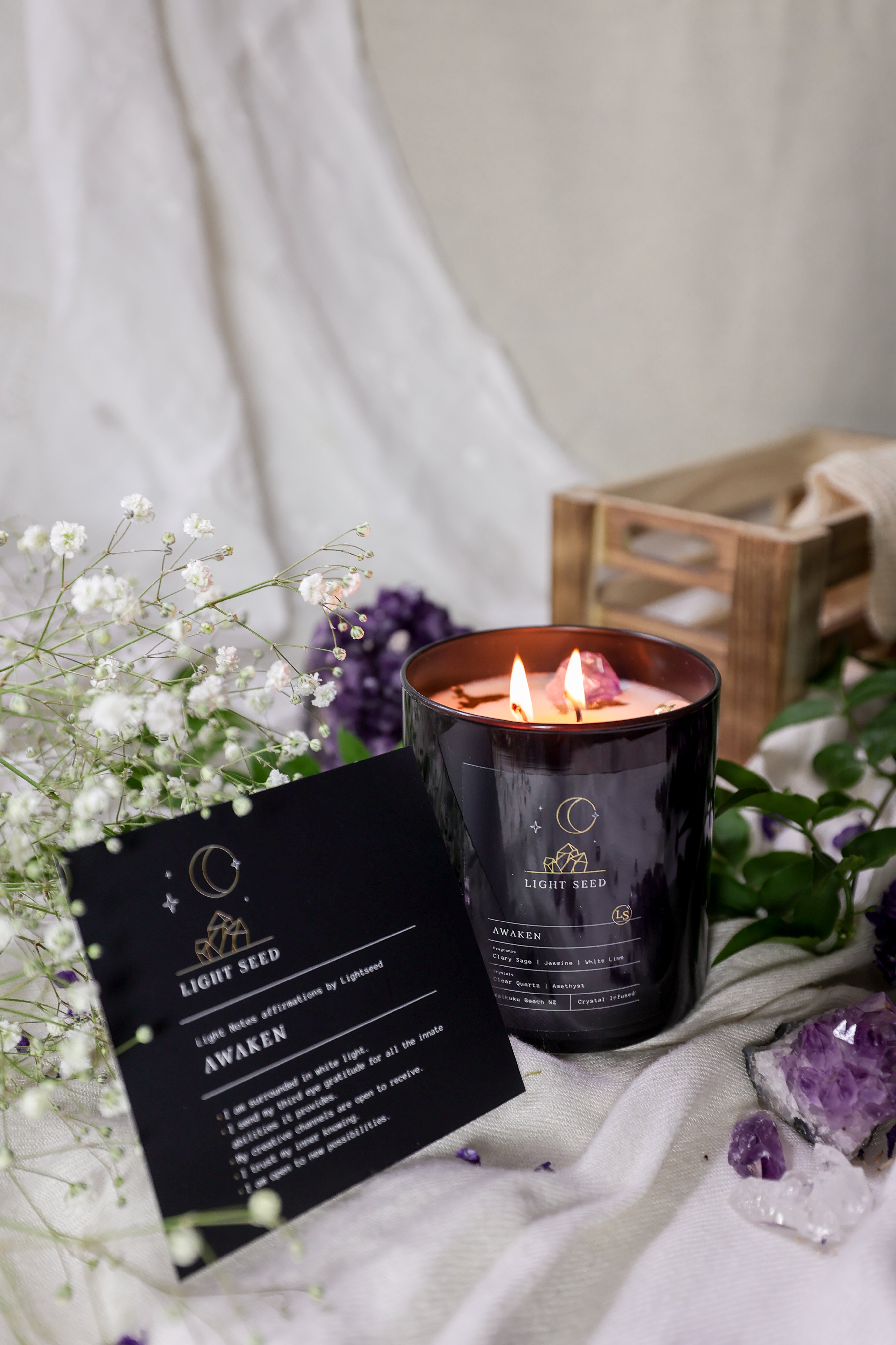 candle with crystals inside to raise vibrations